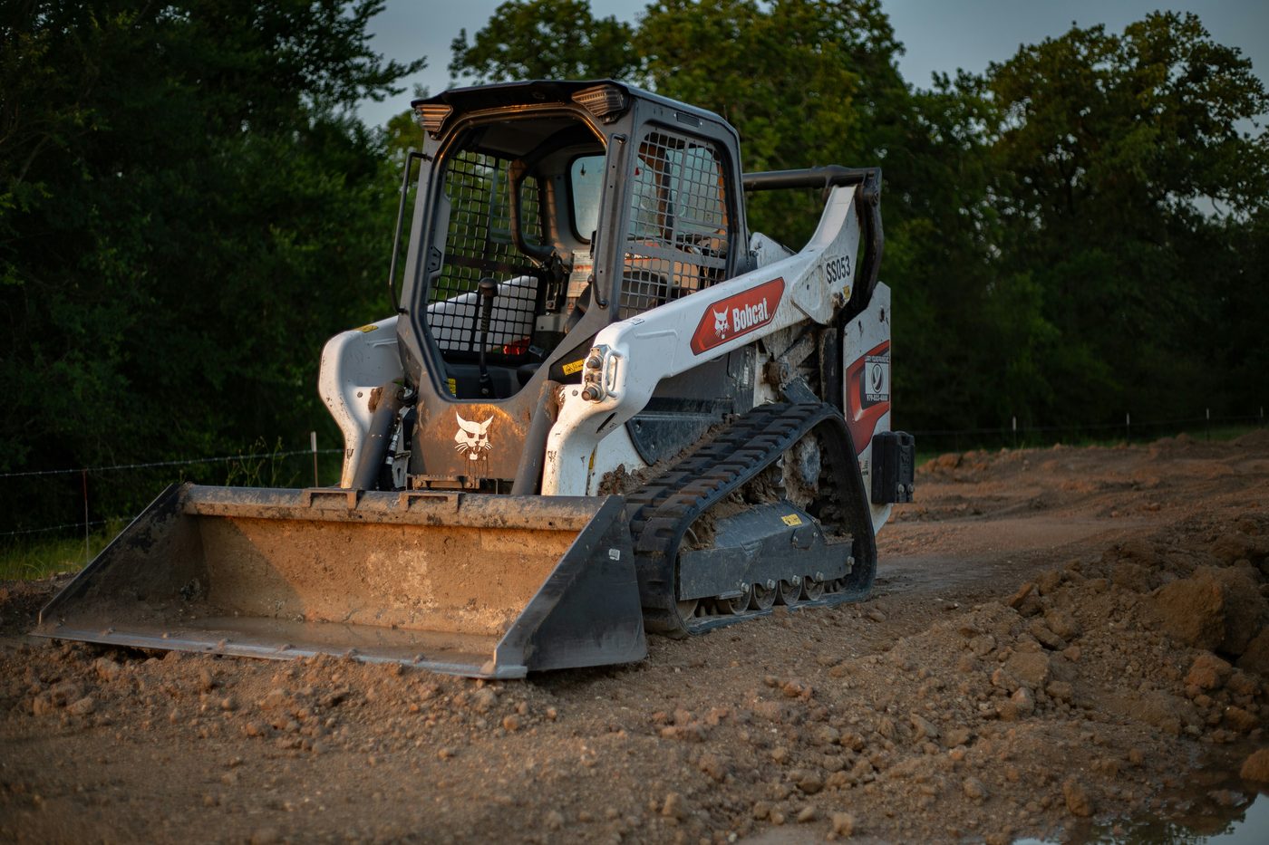 Bobcat compact track loader on rubber tracks at a jobsite